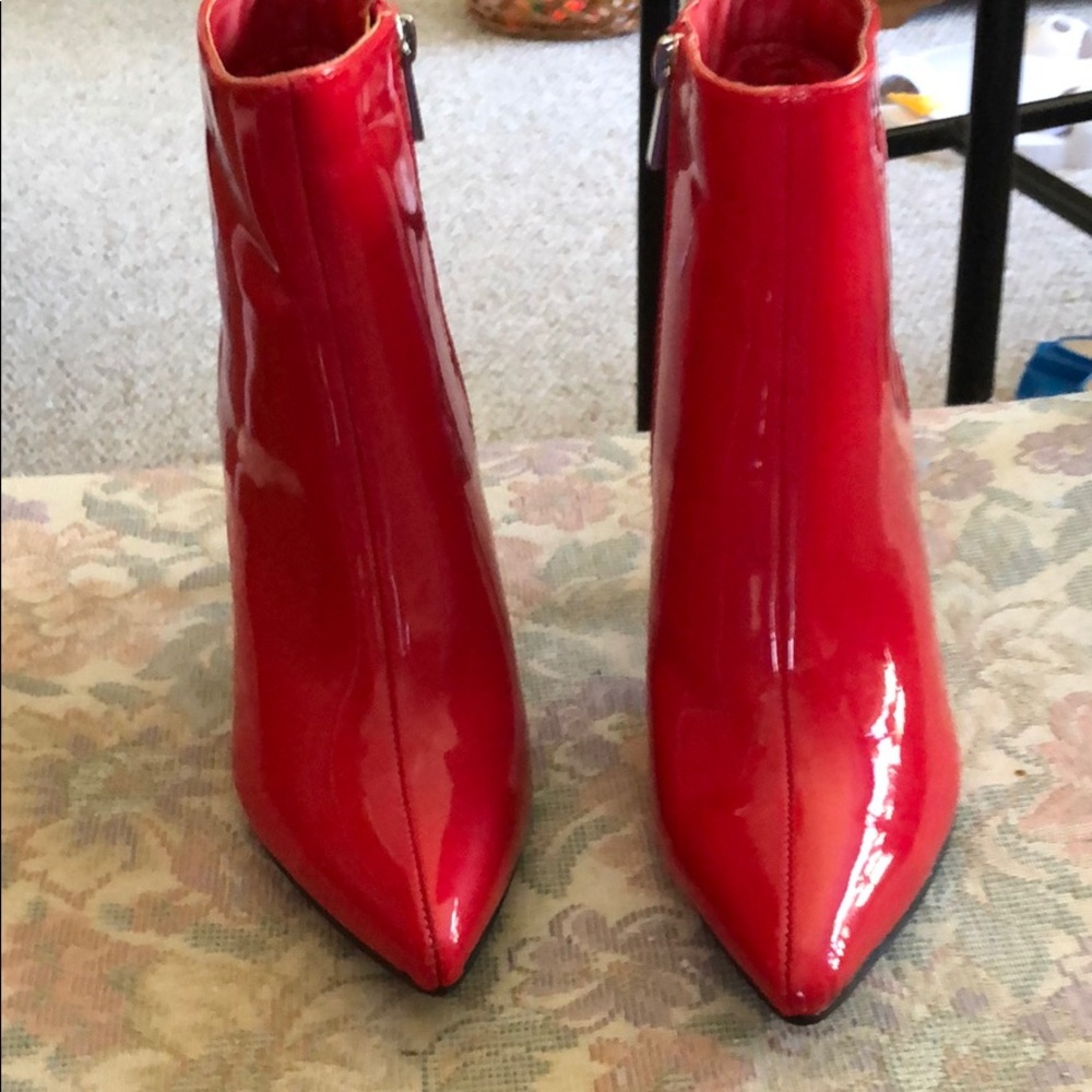 Red patent leather booties.